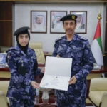 Ajman Police Chief Commends Employee for Outstanding Performance
